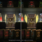 Side-by-side comparison of closed and open Curio Clip-On Angel Wings attached to a Curio Candy Floating Book Display Hanger, backlit on a dark romance bookshelf featuring Sarah J. Maas.
